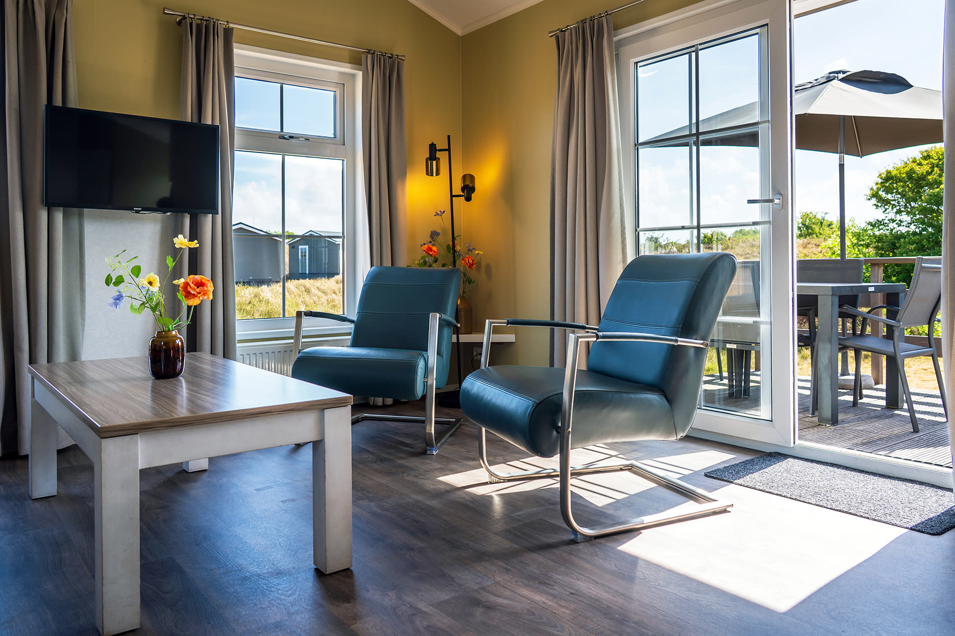 Camping Loodsmansduin, chalet De Hors, woonkamer
