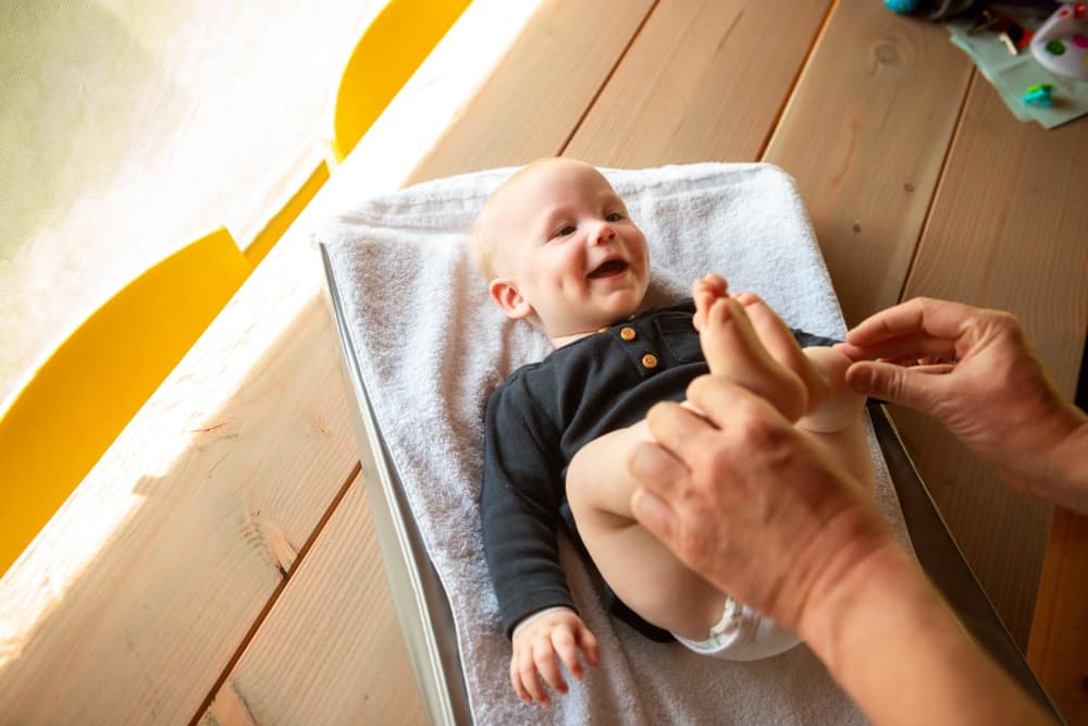 Baby holiday checklist with changing mat at FarmCamps