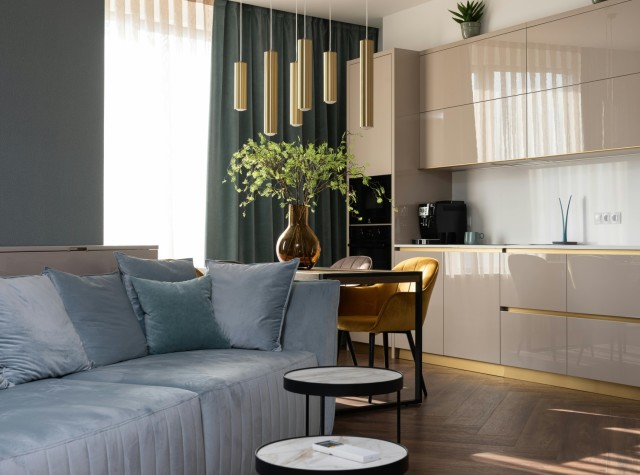 Chic and modern living room of a service apartment featured on the YOSAA platform